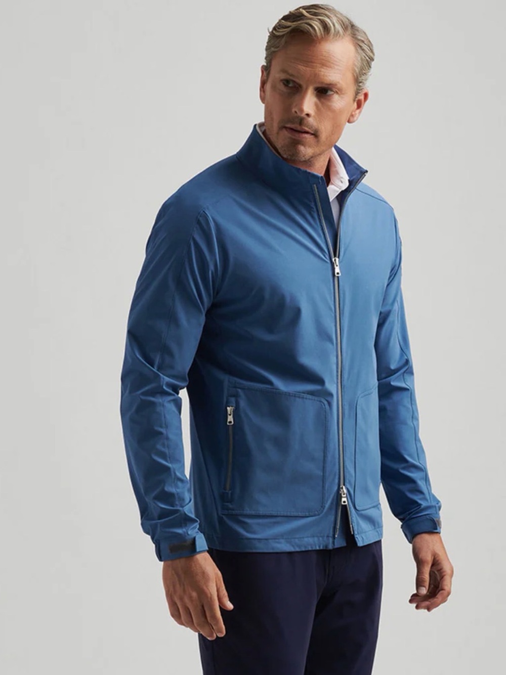 Peter Millar Men's Blue Zip-Front ultra-lightweight, water-resistant jacket.